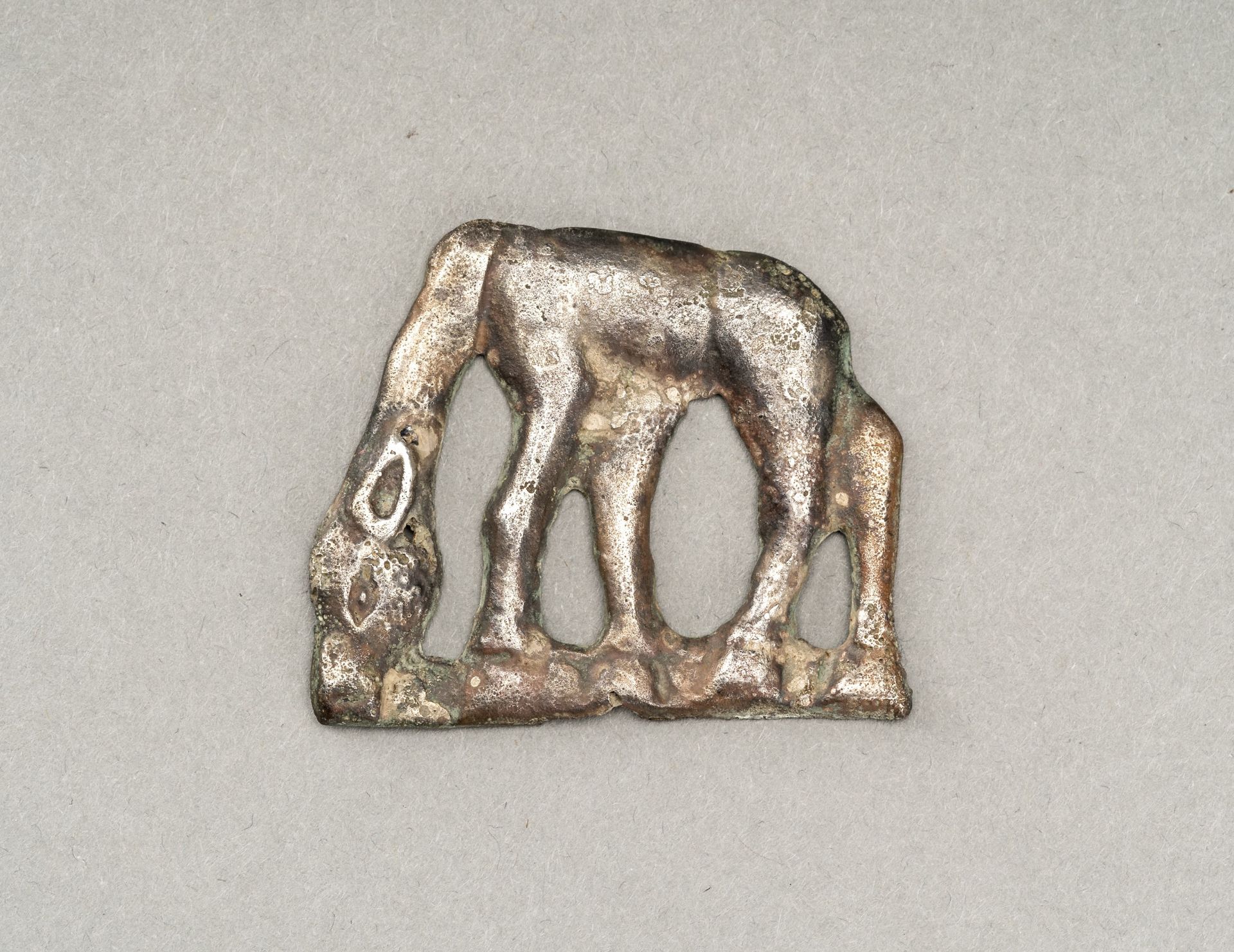 A FINE ORDOS SILVER 'HORSE' ORNAMENT