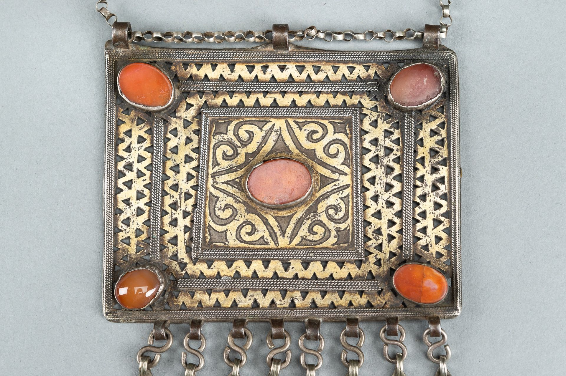 A TURKOMAN METAL AND CARNELIAN CHEST ORNAMENT, c. 1900s - Image 7 of 10