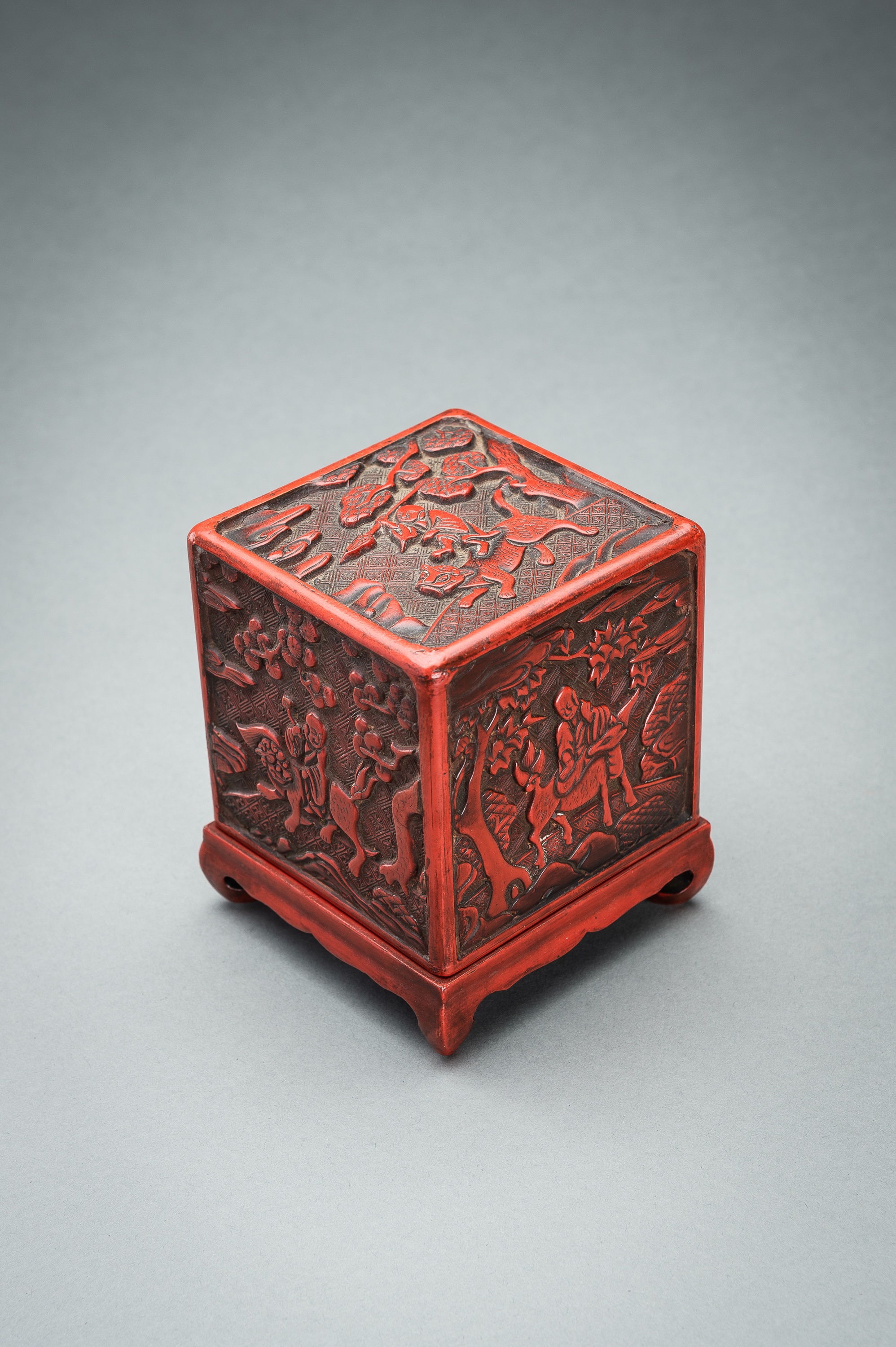A CINNABAR LACQUER 'IMMORTALS AND BUDAI' BOX AND COVER, QING - Image 2 of 14