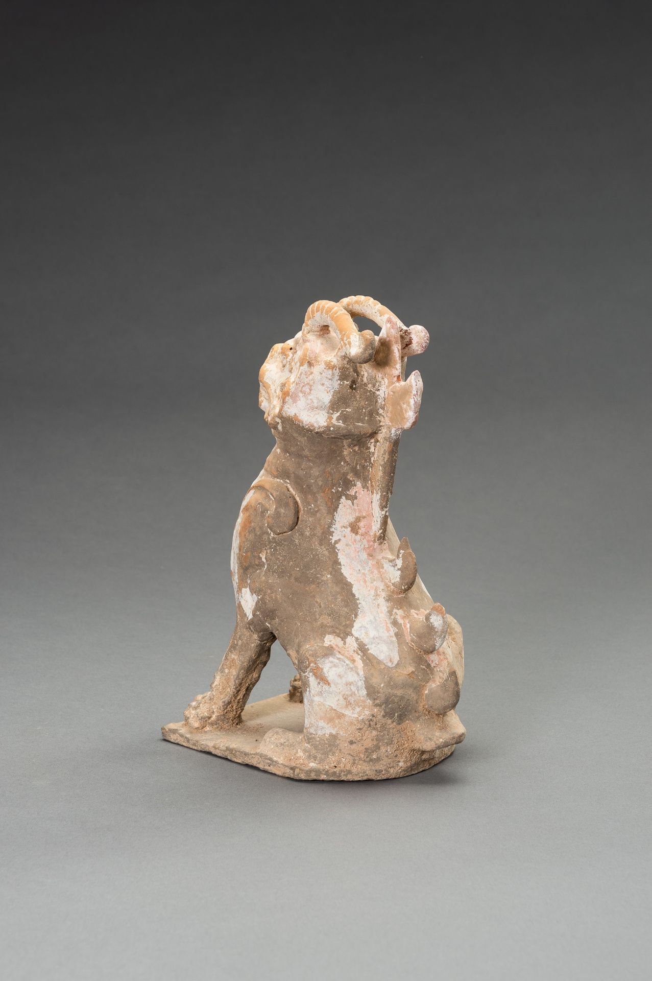 A POTTERY FIGURE OF A HORNED GUARDIAN BEAST, TANG DYNASTY OR EARLIER - Image 11 of 13