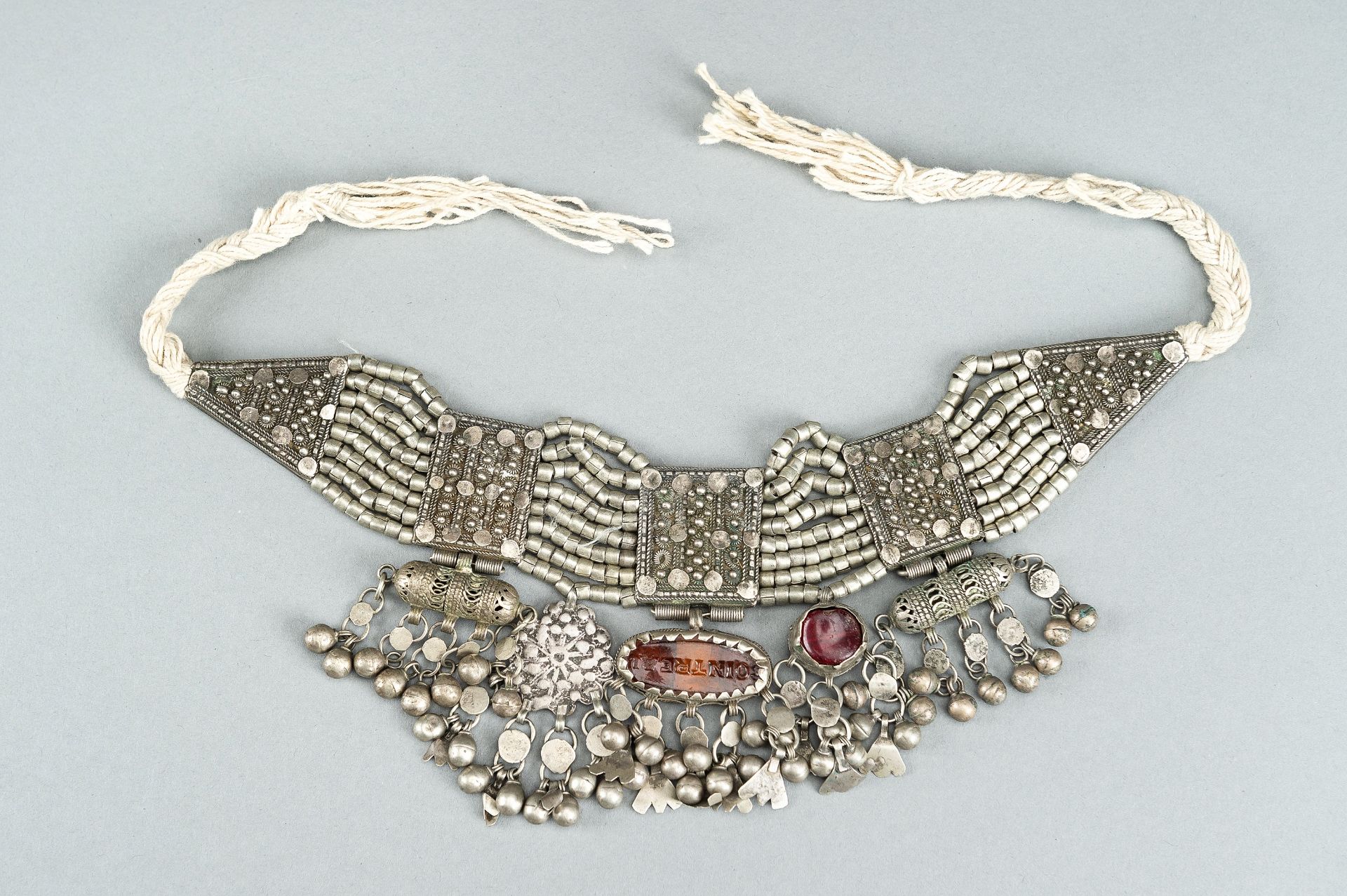 A GROUP OF THREE WHITE METAL LAZEM AMULET NECKLACES, c 1930s - Bild 9 aus 16