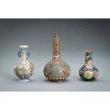 A GROUP OF THREE MINIATURE BOTTLE VASES, c. 1920s