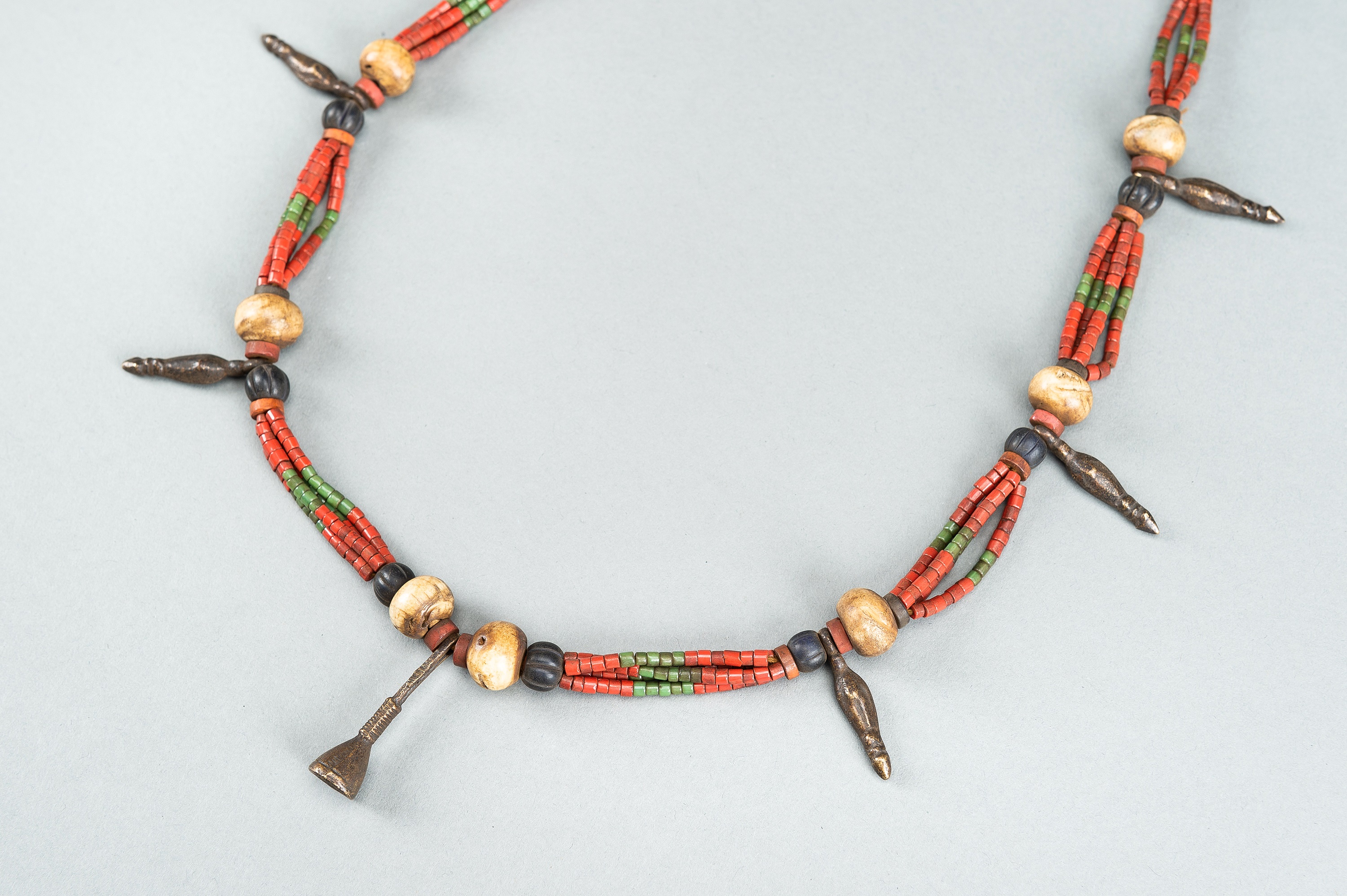 A NAGALAND MULTI-COLORED GLASS, BRASS AND SHELL NECKLACE, c. 1900s