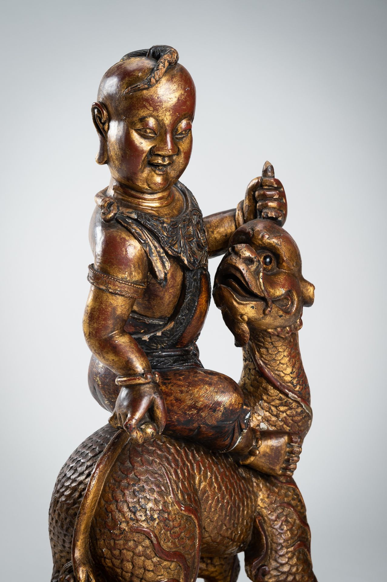A VERY LARGE GILT-LACQUERED WOOD STATUE OF YOUNG BUDDHA RIDING QILIN - Image 12 of 19