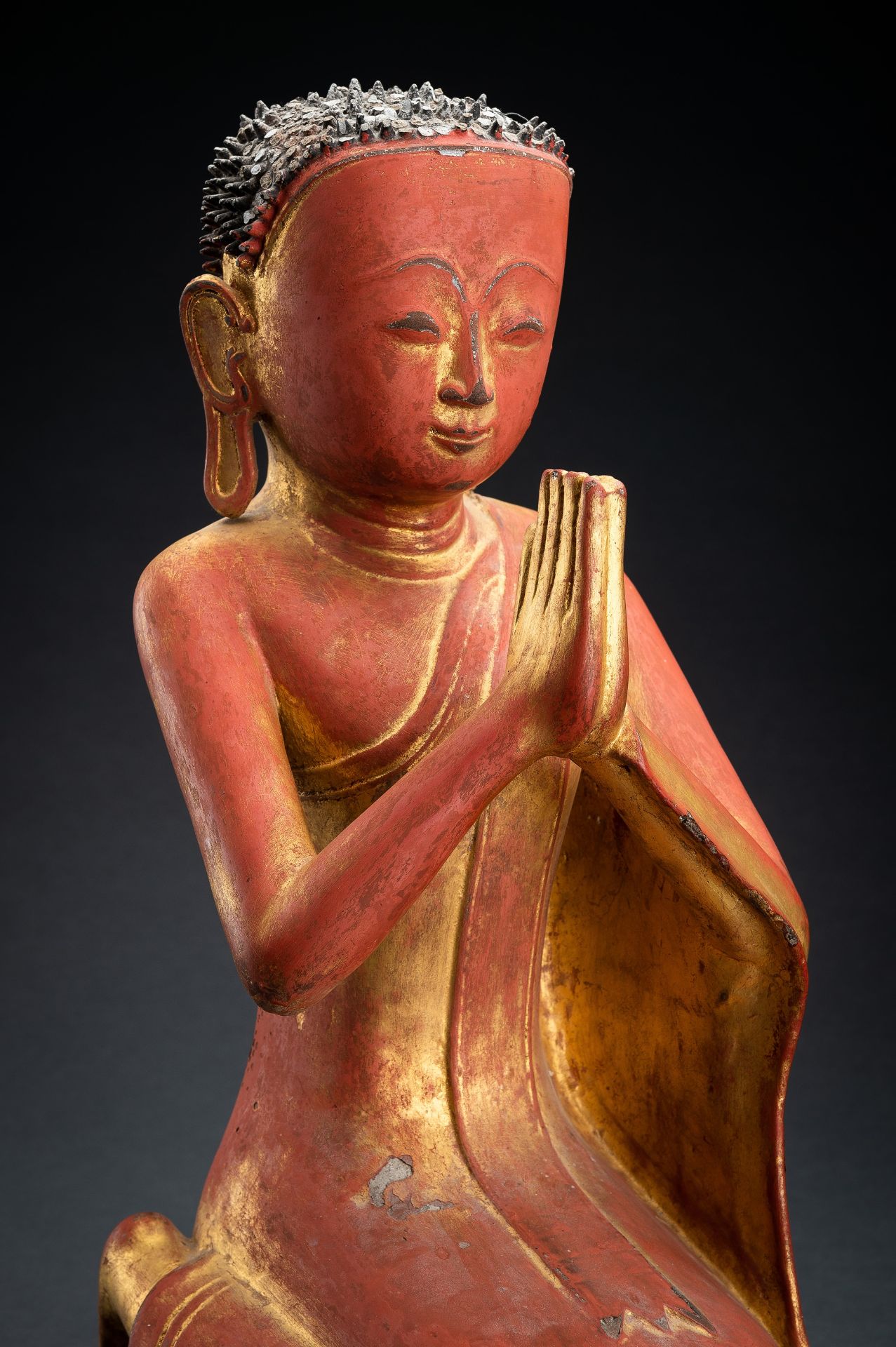 A BURMESE LACQUERED PAPER MACHE FIGURE OF A MONK, 18th - 19th CENTURY