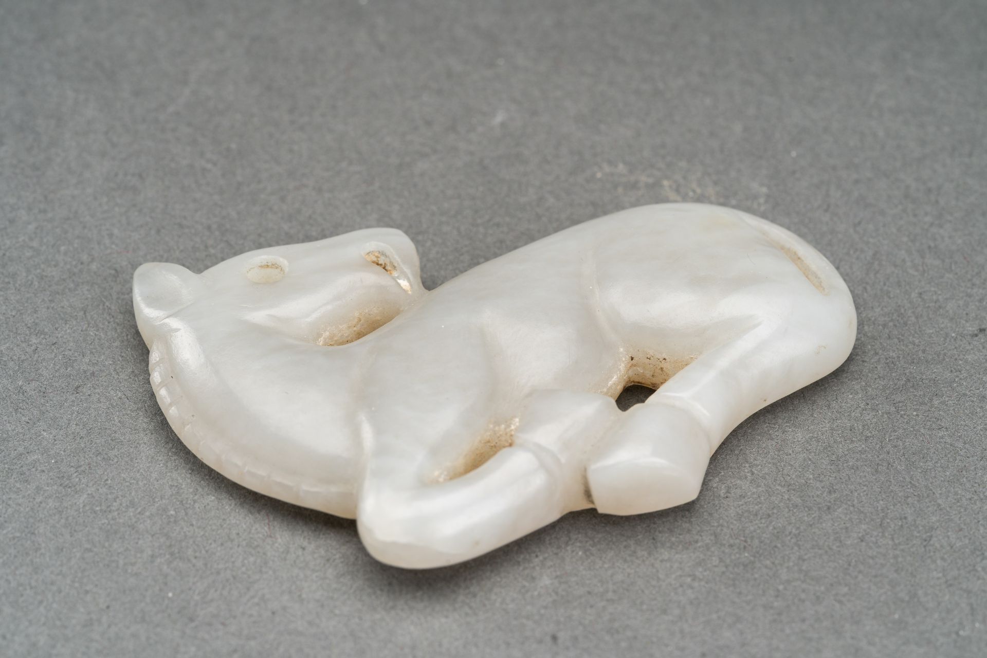 A GRAY JADE PENDANT OF A RECUMBENT HORSE, c. 1920s - Image 2 of 7