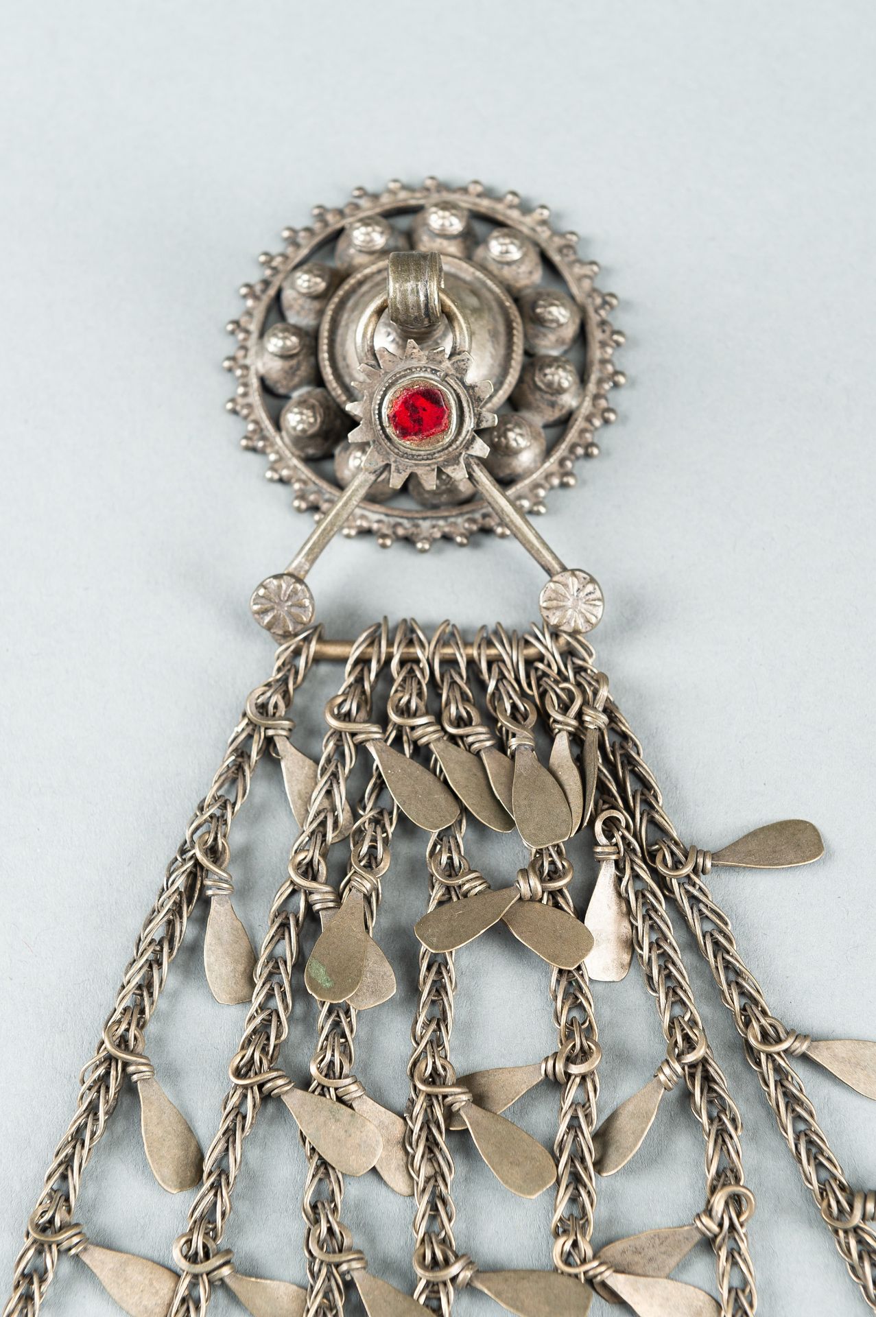 THREE TRIBAL AFGHAN METAL ORNAMENTS WITH INSETS, c. 1950s - Image 5 of 16