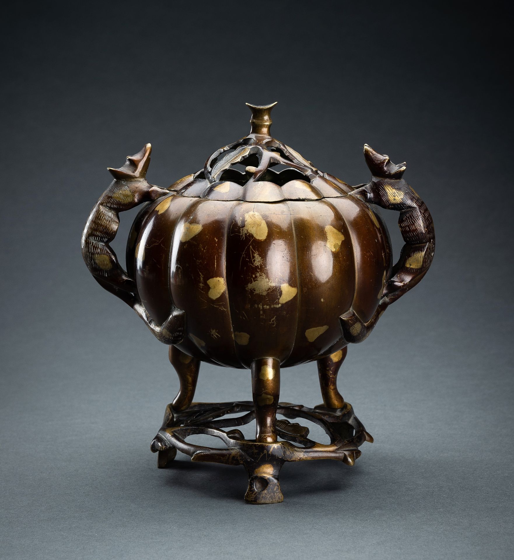 A PUMPKIN SHAPED GOLD SPLASH BRONZE TRIPOD CENSER, 19th CENTURY