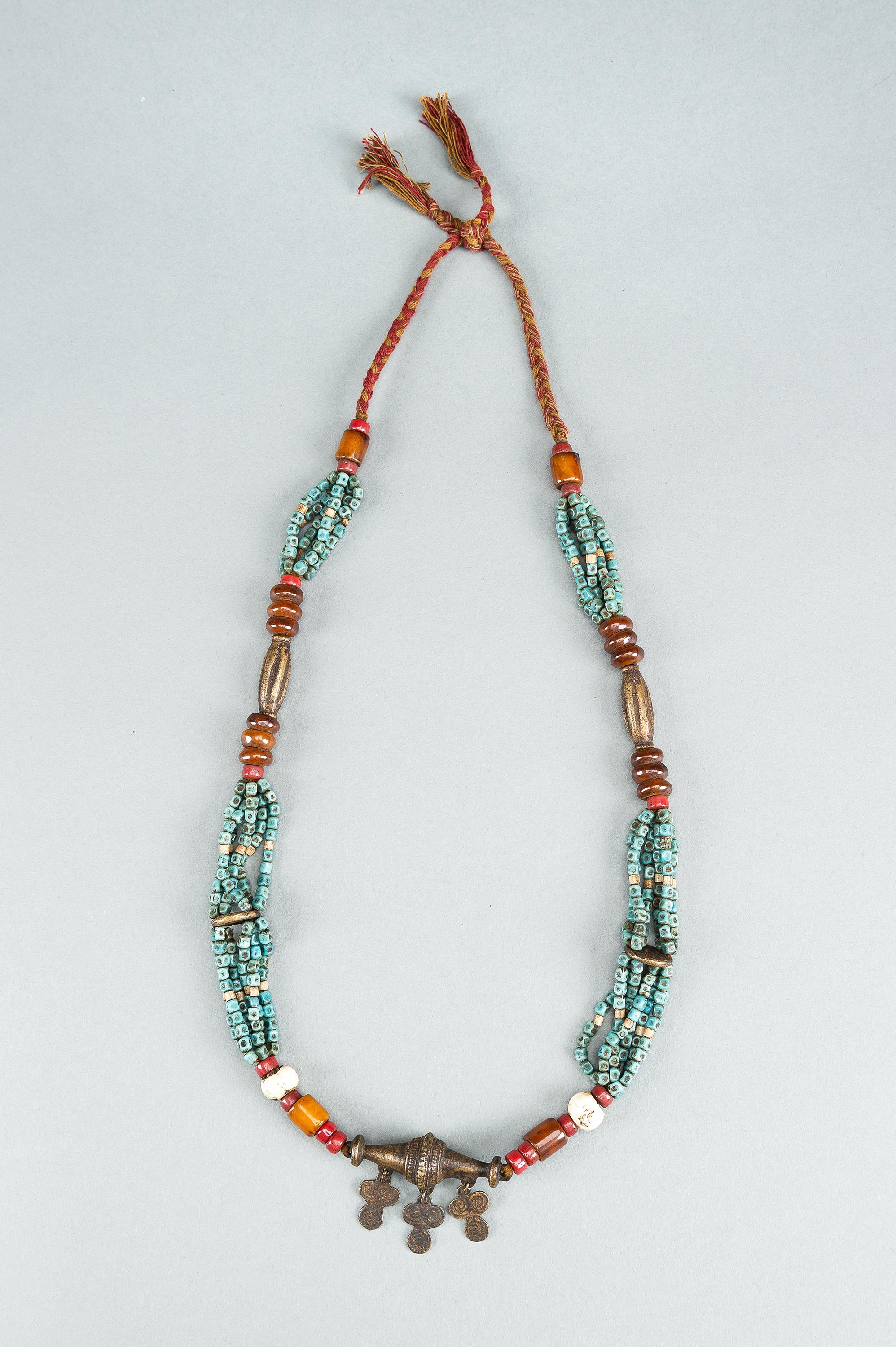 A NAGALAND MULTI-COLORED GLASS, BRASS AND SHELL NECKLACE, c. 1900s - Image 2 of 9