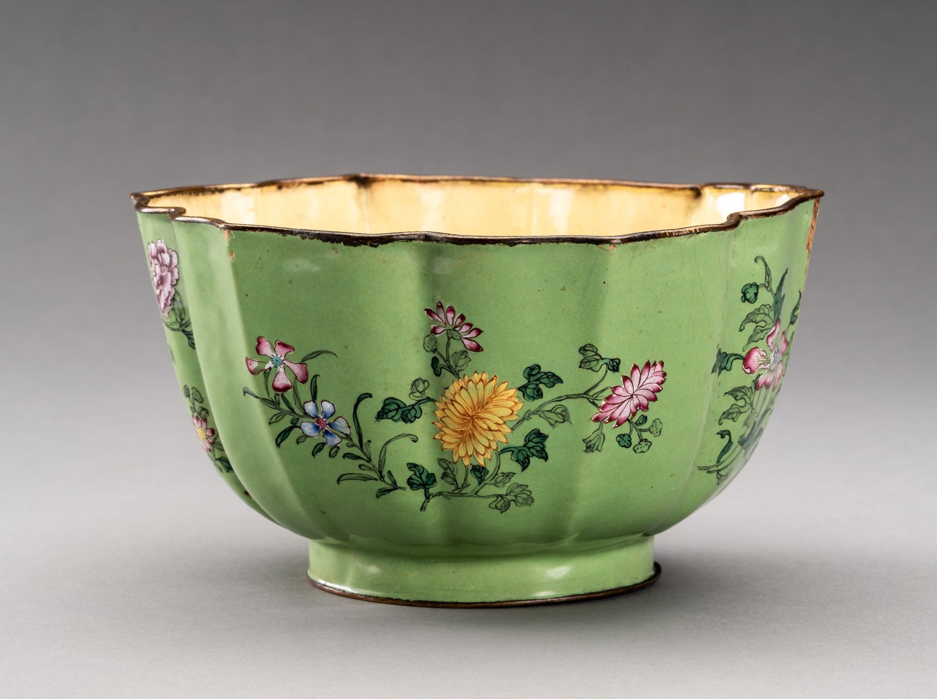 A LARGE LOBED CANTON ENAMEL BOWL, QING