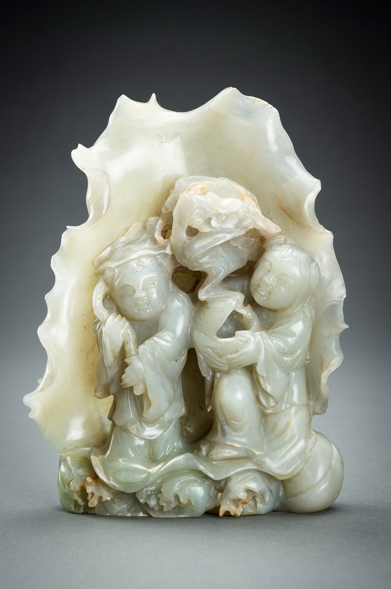 A CELADON JADE Â´HEHE ERXIANÂ´ GROUP, c. 1920s