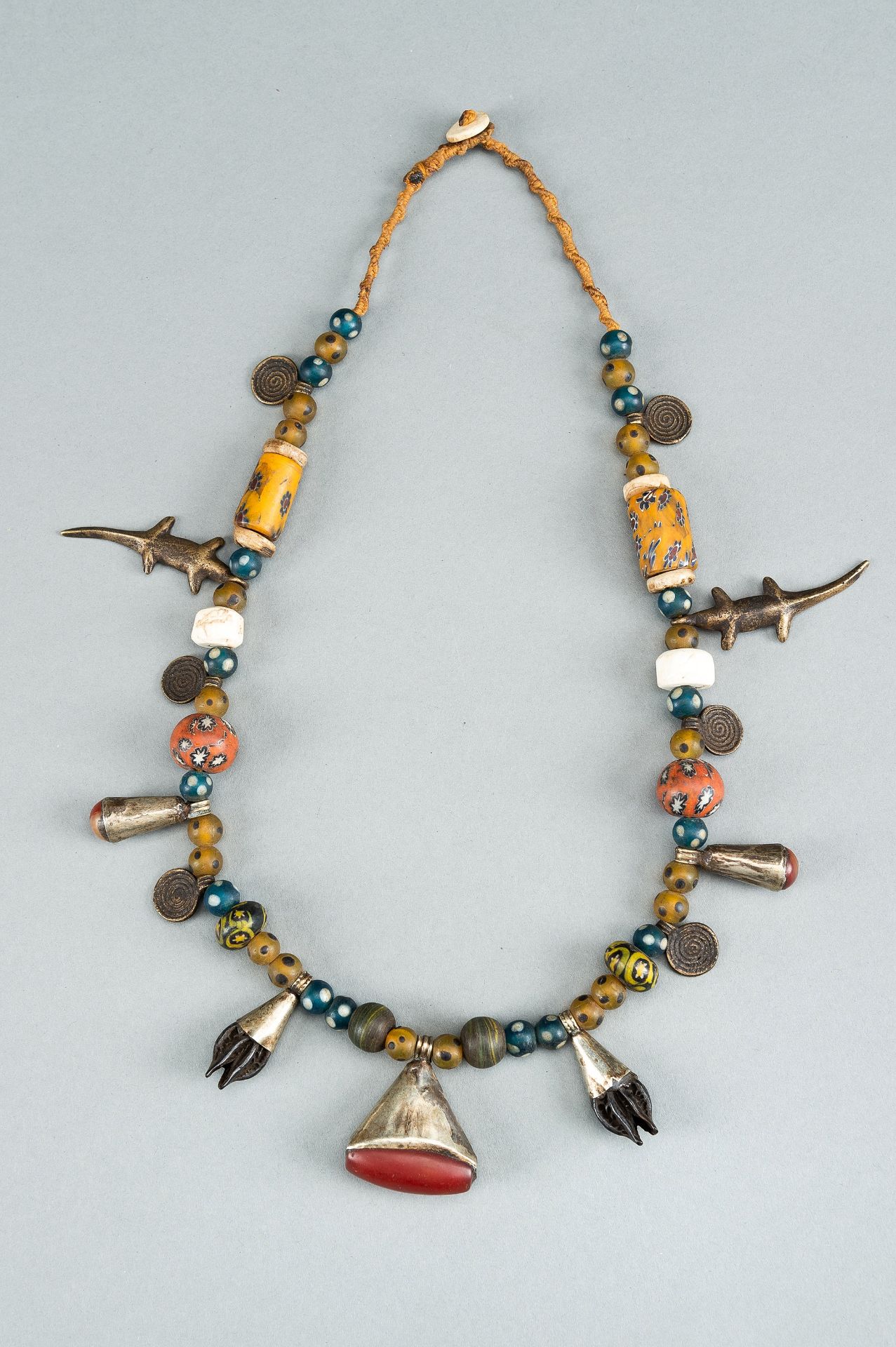 A NAGALAND MULTI-COLORED GLASS, BRASS AND SHELL NECKLACE, c. 1900s