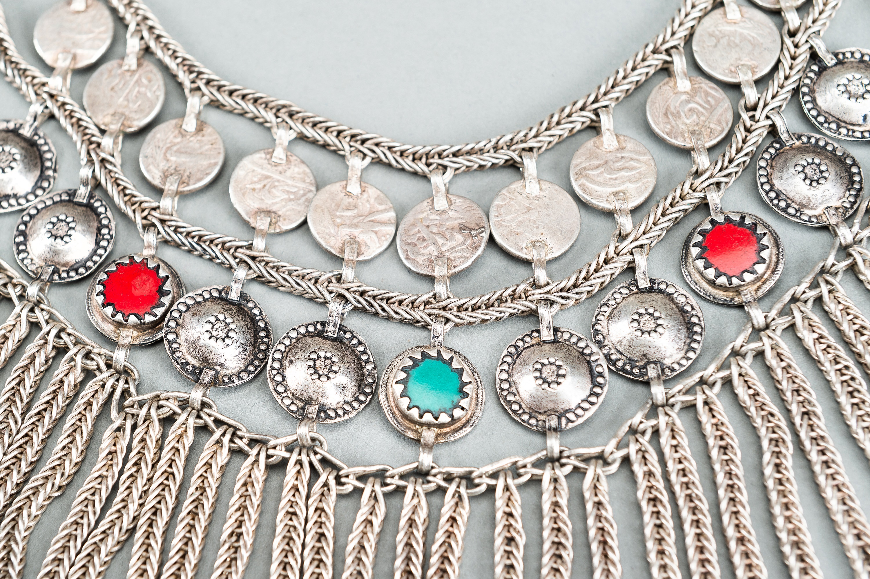 A TRIBAL AFGHAN MULTI-STRAND SILVER NECKLACE WITH GLASS INSETS, c. 1950s - Image 11 of 13