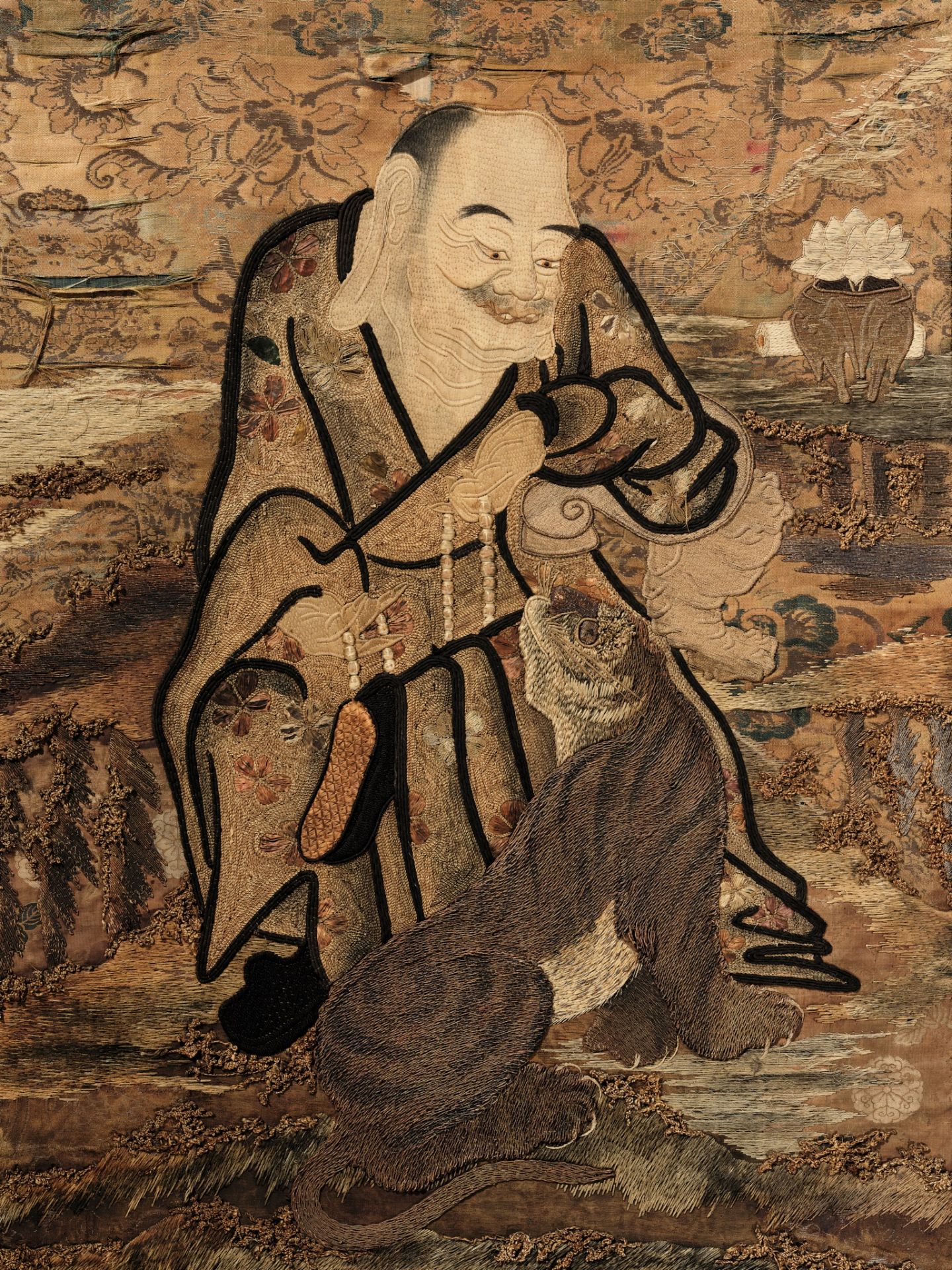 A LARGE EMBROIDERED SILK PANEL WITH BINZURU RAKAN AND HIS TIGER