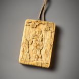 AN IVORY PENDANT DEPICTING LI TIEGUAI AND KUI XING, MING DYNASTY