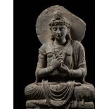 A LARGE GRAY SCHIST FIGURE OF MAITREYA, KUSHAN PERIOD, ANCIENT REGION OF GANDHARA, CIRCA 3RD CENTURY