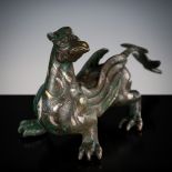 A SILVER- AND GOLD-INLAID 'MYTHICAL BEAST' BRONZE, CHINA, 17TH-18TH CENTURY