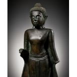 A LARGE BRONZE FIGURE OF THE STANDING BUDDHA, AYUTTHAYA KINGDOM (1351-1767)