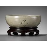 A SLIP-INLAID CELADON-GLAZED STONEWARE 'FLORAL' BOWL, GORYEO DYNASTY