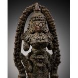 AN ELABORATE KERALA BRONZE FIGURE OF A FEMALE DEITY, POSSIBLY KALI