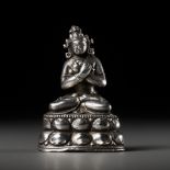 A SMALL SILVER FIGURE OF VAJRADHARA, TIBET, 18th-19th CENTURY