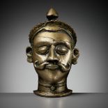 A BRASS LINGAM COVER WITH THE HEAD OF SHIVA, MAHARASHTRA, 18TH - 19TH CENTURY