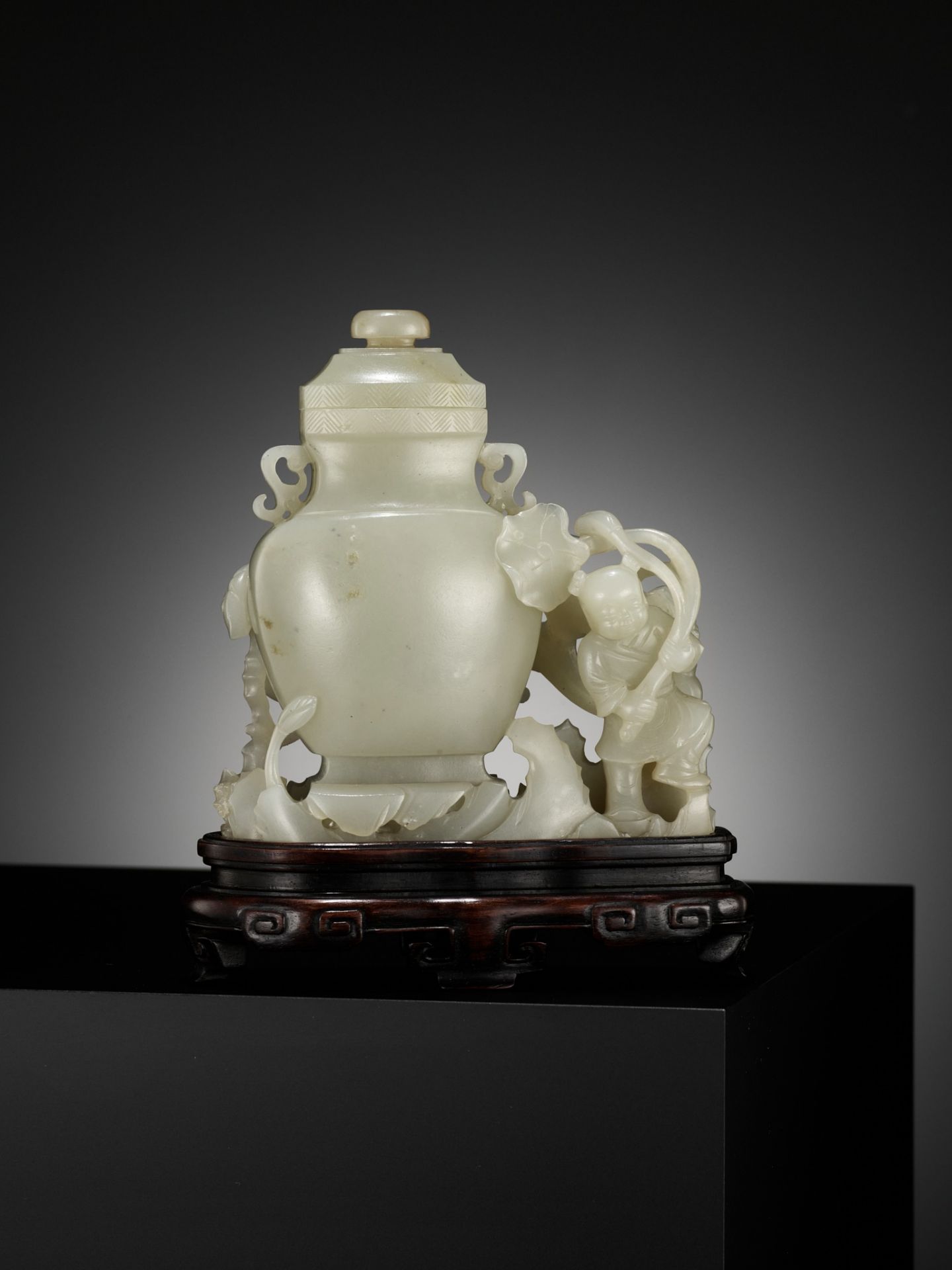 A CELADON JADE 'BOY AND CHILONG' VASE AND COVER, LATE QING TO REPUBLIC PERIOD - Image 9 of 12