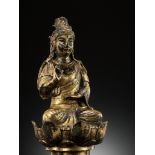 A GILT-BRONZE FIGURE OF AVALOKITESHVARA, LIAO DYNASTY, CHINA, 907-1125