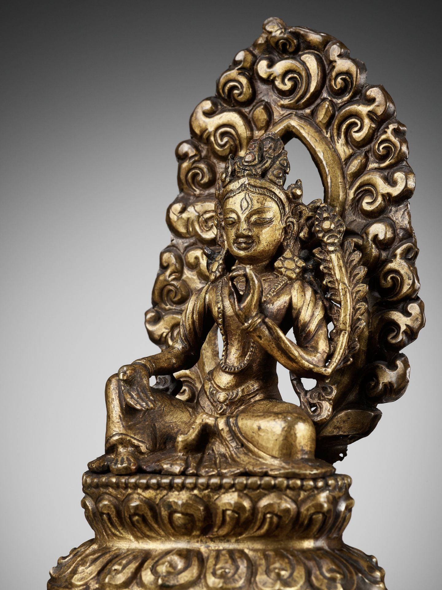 A GILT COPPER REPOUSSE FIGURE OF TARA, NEPAL, 18TH-19TH CENTURY - Image 2 of 15
