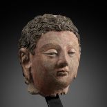 A POLYCHROME STUCCO HEAD OF BUDDHA, ANCIENT REGION OF GANDHARA, 4TH-5TH CENTURY