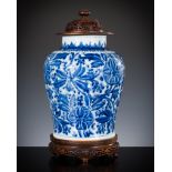A LARGE BLUE AND WHITE 'LOTUS' JAR, TRANSITIONAL PERIOD