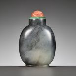 A BLACK AND WHITE JADE SNUFF BOTTLE, CHINA, 18TH CENTURY