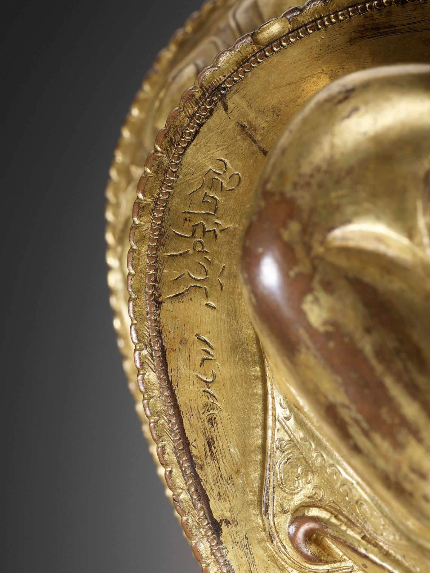 A GILT COPPER-ALLOY REPOUSSE FIGURE OF BUDDHA AMITABHA, WITH AN INSCRIPTION REFERRING TO THE SECOND - Image 9 of 16