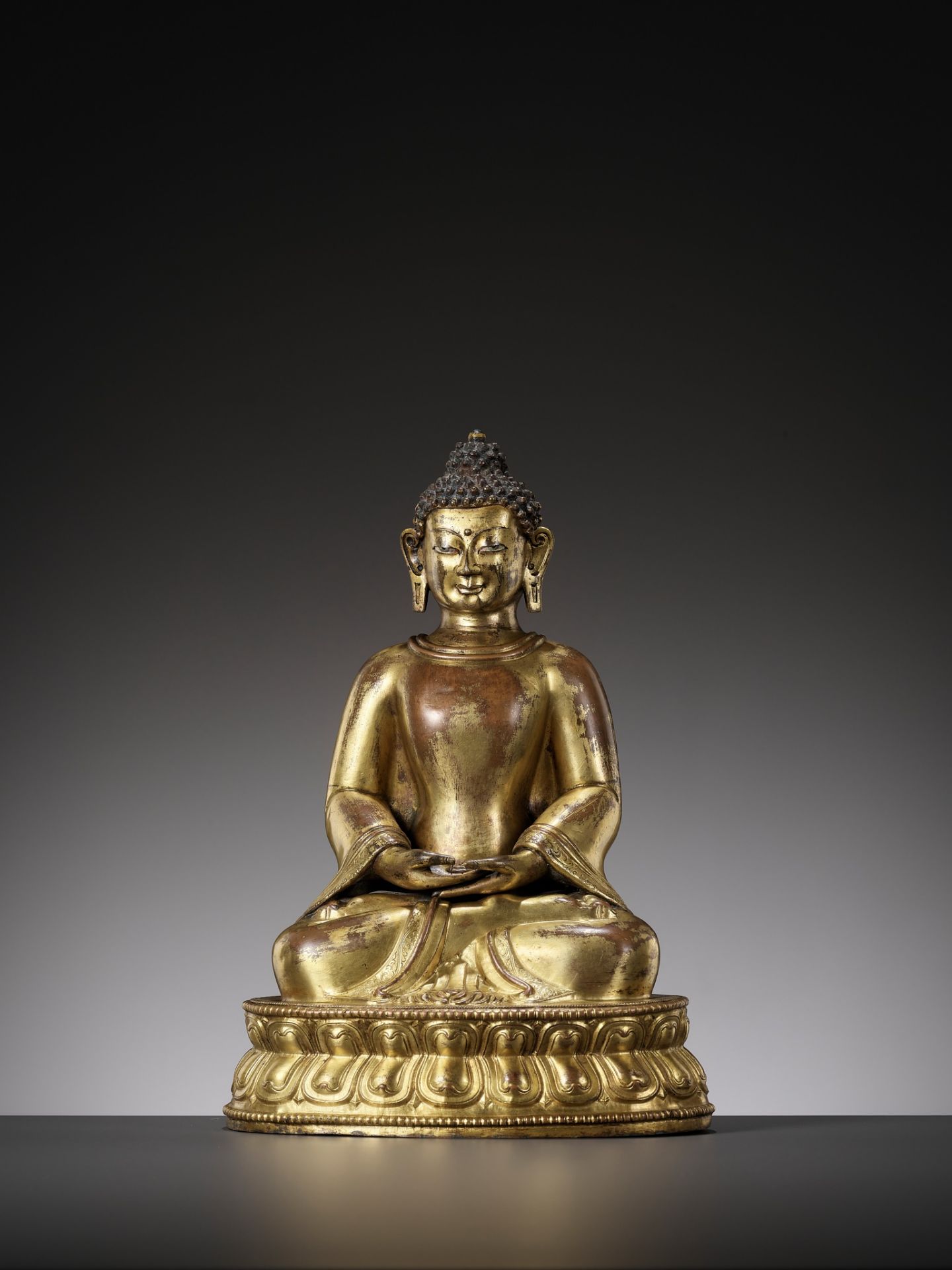A GILT COPPER-ALLOY REPOUSSE FIGURE OF BUDDHA AMITABHA, WITH AN INSCRIPTION REFERRING TO THE SECOND - Image 2 of 16