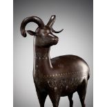 A QAJAR SILVER- AND GOLD-DAMASCENED IRON FIGURE OF AN IBEX, PERSIA, 19TH CENTURY