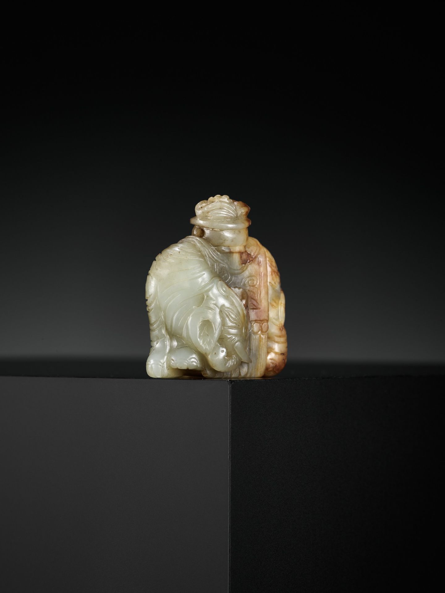 A CELADON AND RUSSET JADE OF AN ELEPHANT LADEN WITH AUSPICIOUS FRUIT, LATE MING TO MID-QING DYNASTY - Image 7 of 13