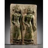 A GLAZED POTTERY TILE DEPICTING THE TWO DAUGHTERS OF MARA, PEGU KINGDOM, 15TH-16TH CENTURY