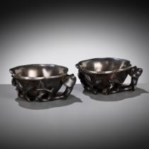 A PAIR OF SILVER-LINED ZITAN 'MAGNOLIA' LIBATION CUPS, CHINA, 18TH CENTURY