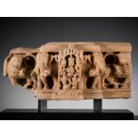 A SANDSTONE STELE DEPICTING LAKSHMI, ELEPHANTS AND LIONS, CENTRAL INDIA, 10TH-12TH CENTURY