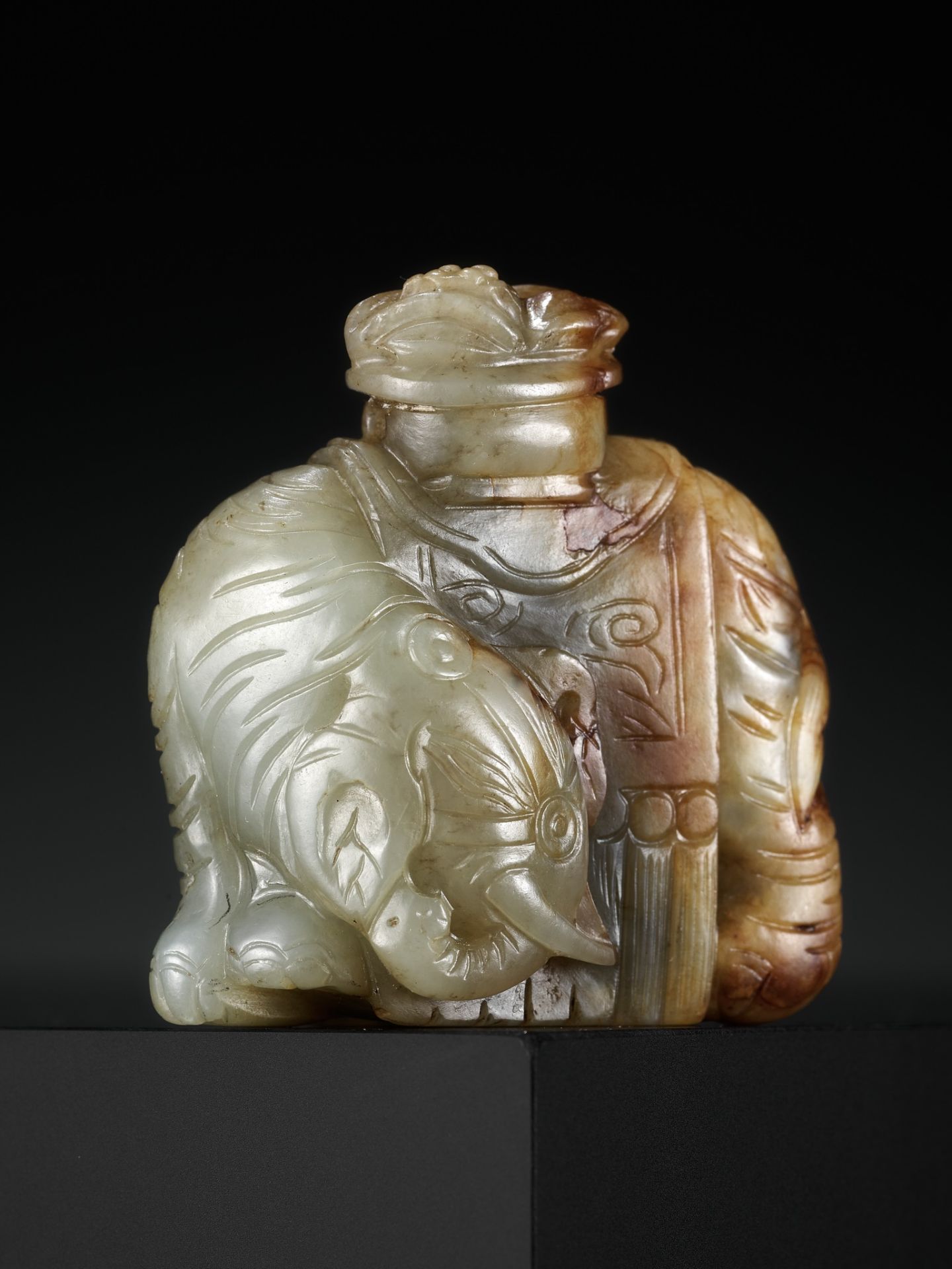A CELADON AND RUSSET JADE OF AN ELEPHANT LADEN WITH AUSPICIOUS FRUIT, LATE MING TO MID-QING DYNASTY - Image 10 of 13