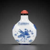 AN INSCRIBED SAPPHIRE-BLUE OVERLAY GLASS SNUFF BOTTLE, YANGZHOU SCHOOL, CHINA, 1800-1880