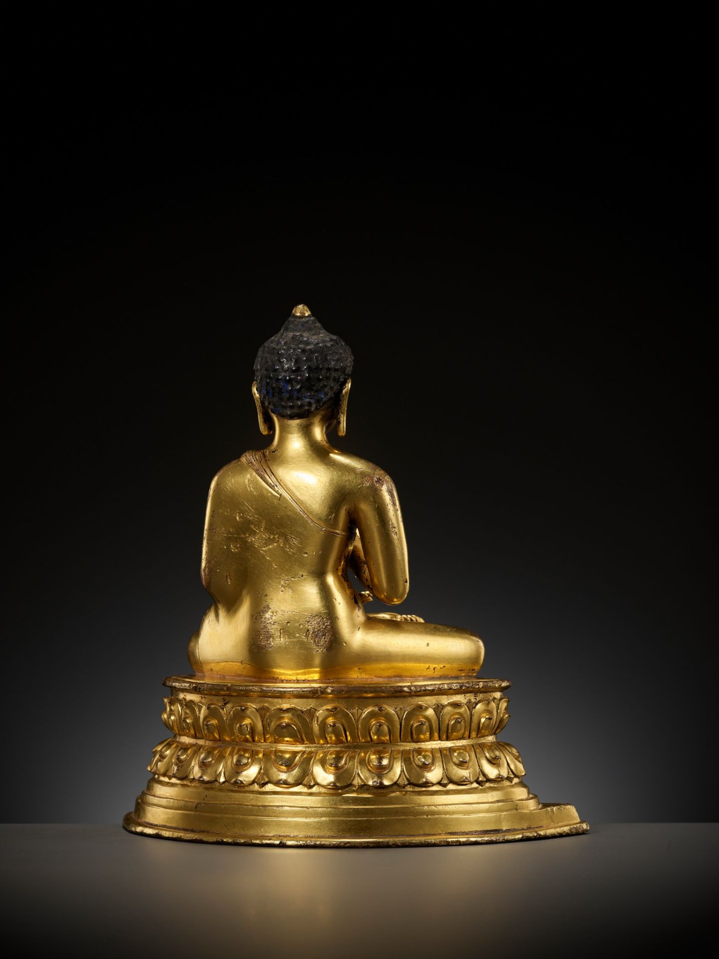 A GILT COPPER ALLOY FIGURE OF AMOGHASIDDHI, POSSIBLY DENSATIL, TIBET, 14TH-15TH CENTURY - Image 17 of 22