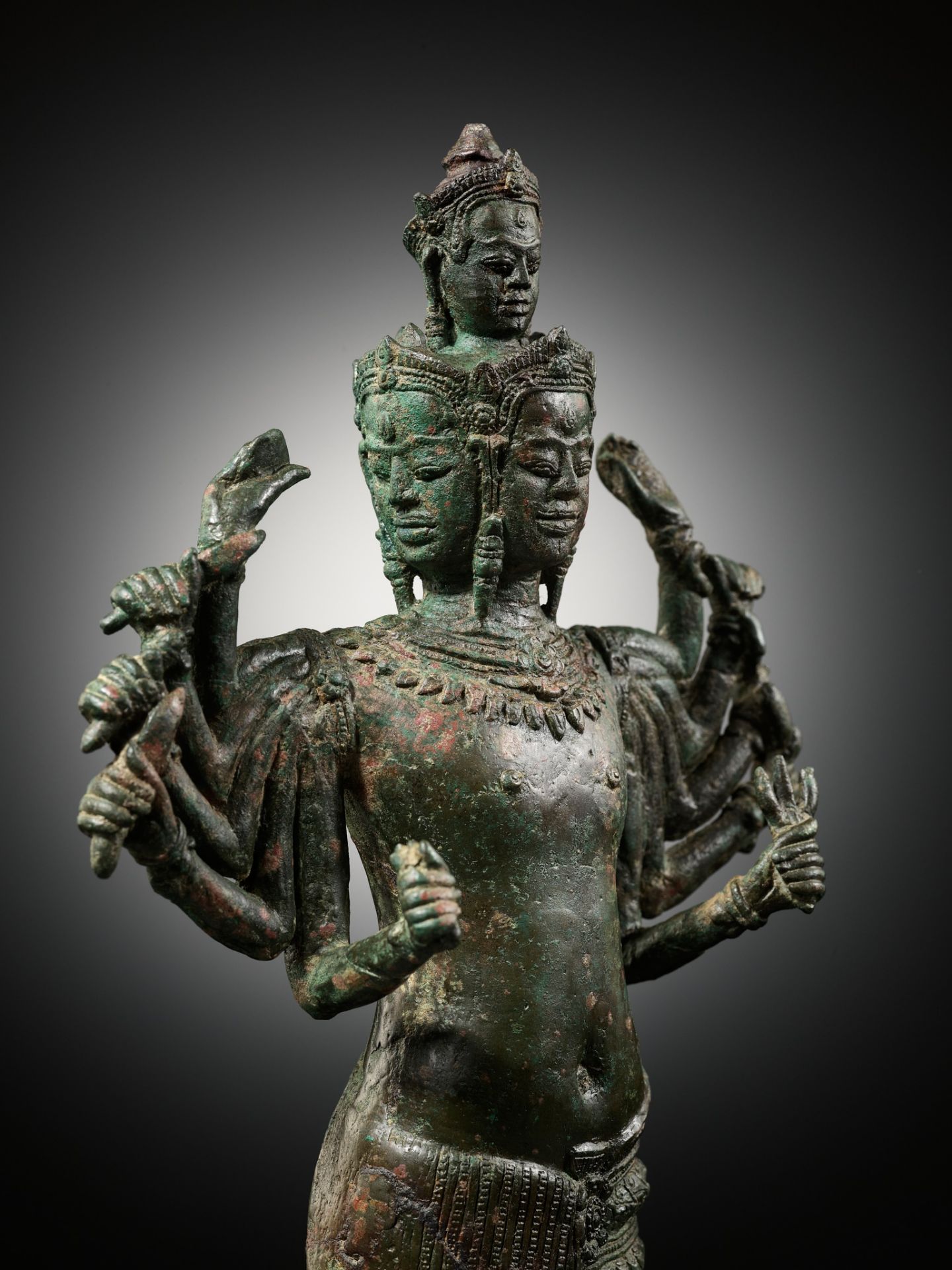 A LARGE AND IMPORTANT BRONZE FIGURE OF SADASHIVA, ANGKOR PERIOD, BAYON STYLE