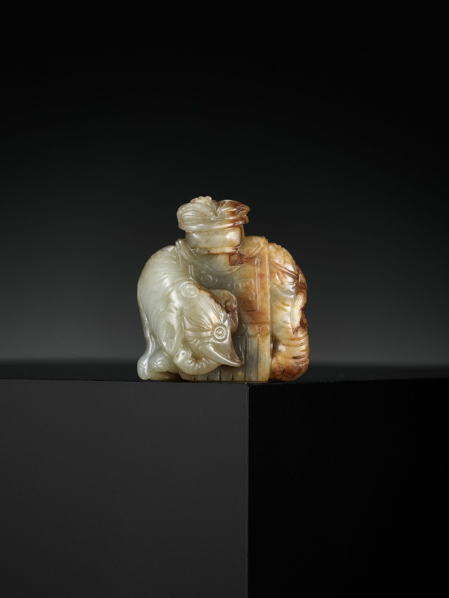 A CELADON AND RUSSET JADE OF AN ELEPHANT LADEN WITH AUSPICIOUS FRUIT, LATE MING TO MID-QING DYNASTY - Image 9 of 13
