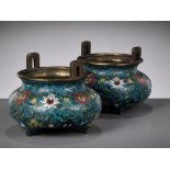 A PAIR OF CLOISONNE ENAMEL BOMBE-FORM TRIPOD CENSERS, EARLY QING DYNASTY