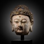 A STUCCO HEAD OF BUDDHA, YUAN TO MING DYNASTY