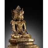 AN ARAKAN STYLE GILT BRONZE FIGURE OF BUDDHA RATNASAMBHAVA, BURMA, 16TH - 17TH CENTURY