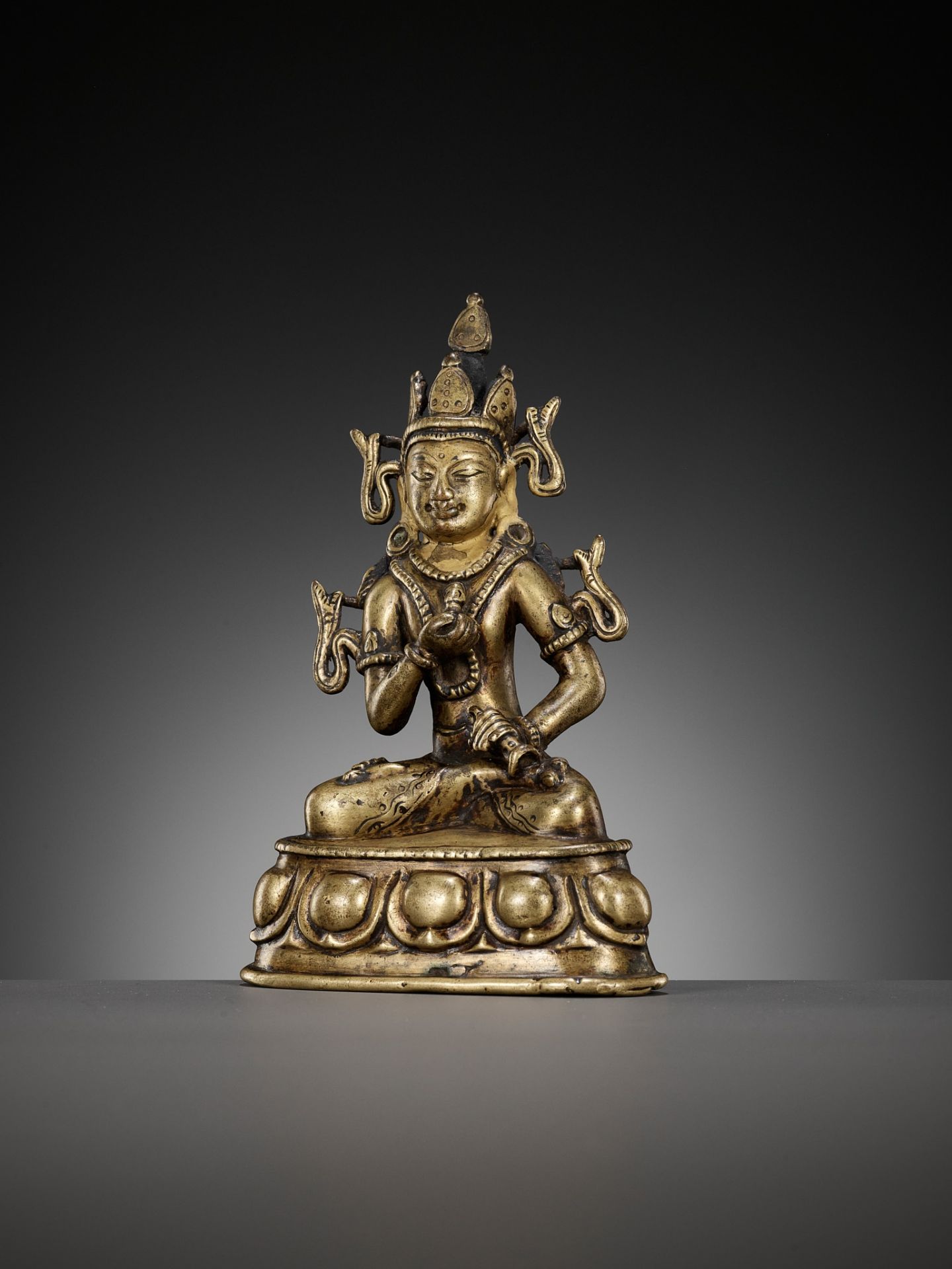 A GILT-BRONZE AND TURQUOISE-INLAID FIGURE OF VAJRASATTVA, KASHMIR STYLE, WEST TIBET, 12TH CENTURY - Image 3 of 10