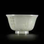 AN INSCRIBED AND TRANSLUCENT JADE 'ORCHIDS' BOWL, CHINA, 18th CENTURY