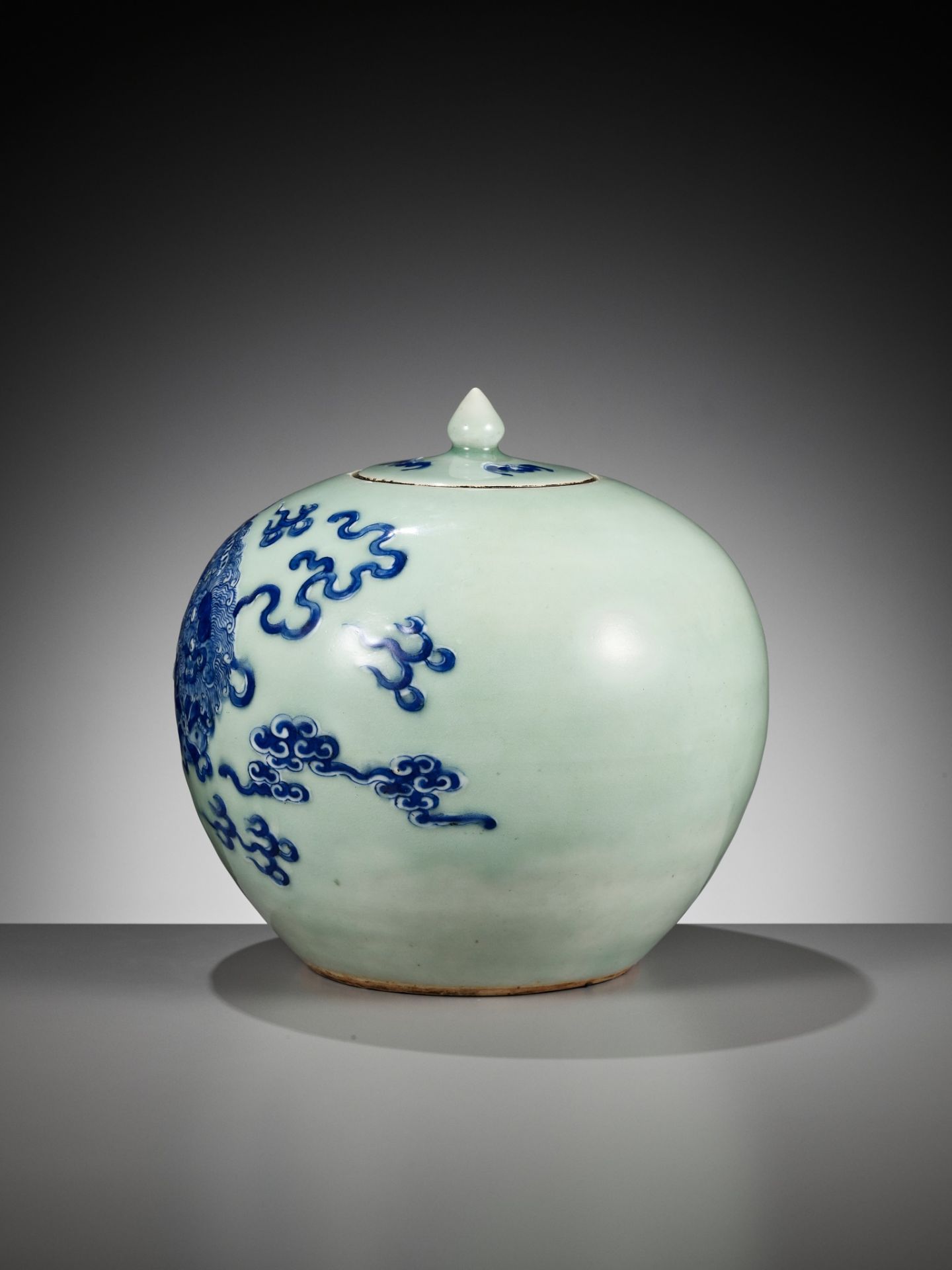 A CELADON-GROUND AND UNDERGLAZE-BLUE JAR AND COVER, CHINA, 19TH - EARLY 20TH CENTURY - Image 2 of 10